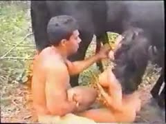 In this xxx zoophilia movie, a couple takes turns gratifying a horse, which has never been seen before.